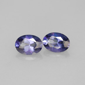 توباز ميستيك طبيعي بلون بنفسجي، وزن ‎‎ قيراط، شكل بيضاوى، مقاس ‎6.9x5.2‎ مم