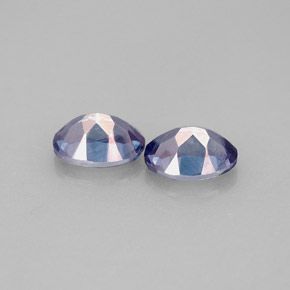 توباز ميستيك طبيعي بلون بنفسجي، وزن ‎‎ قيراط، شكل بيضاوى، مقاس ‎6.9x5.2‎ مم