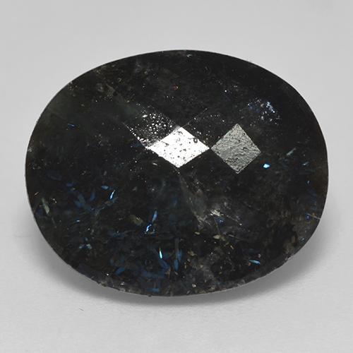 نوميت طبيعي بلون أسود مع بريق أزرق، وزن ‎14.99‎ قيراط، شكل بيضاوى، مقاس ‎18x14.7‎ مم