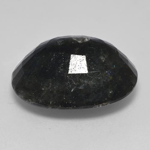 نوميت طبيعي بلون أسود مع بريق أزرق، وزن ‎14.99‎ قيراط، شكل بيضاوى، مقاس ‎18x14.7‎ مم