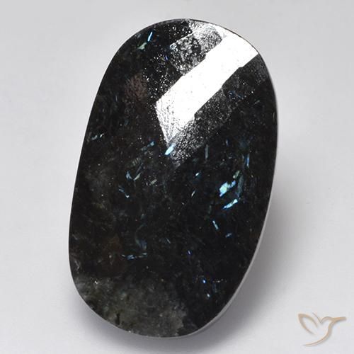 24.26ct طبيعي أسود مع بريق أزرق نوميت, بيضوي, غير شفاف