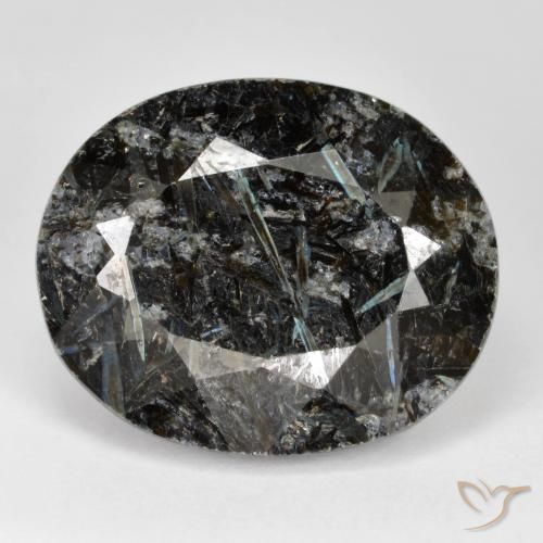 31.63ct طبيعي أسود مع بريق أزرق نوميت, بيضوي, غير شفاف