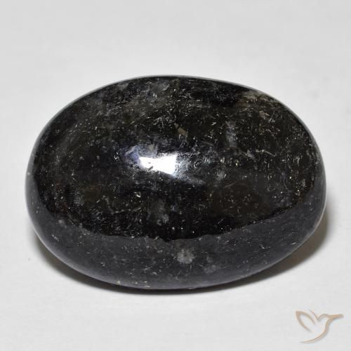 20.25ct طبيعي أسود مع بريق أزرق نوميت, بيضوي, غير شفاف