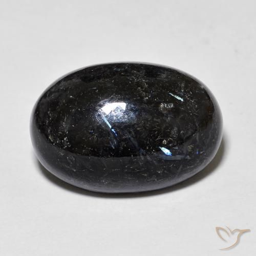 12.71ct طبيعي أسود مع بريق أزرق نوميت, بيضوي, غير شفاف