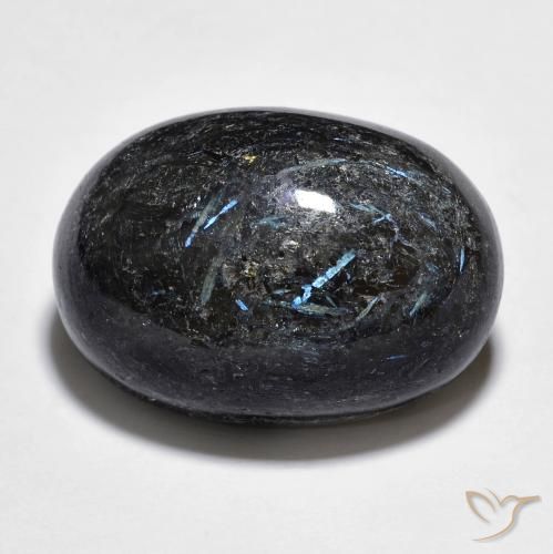 25.34ct طبيعي أسود مع بريق أزرق نوميت, بيضوي, غير شفاف