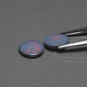 أحجار أوبال دوبليت متعدد الألوان طبيعية، قصة بيضاوى، غير شفاف، وزنها  قيراط