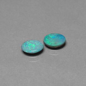 أحجار أوبال دوبليت متعدد الألوان طبيعية، قصة بيضاوى، غير شفاف، وزنها  قيراط