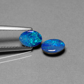 أحجار أوبال دوبليت متعدد الألوان طبيعية، قصة بيضاوى، غير شفاف، وزنها  قيراط