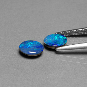 أحجار أوبال دوبليت متعدد الألوان طبيعية، قصة بيضاوى، غير شفاف، وزنها  قيراط