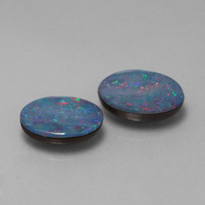 أوبال مزدوج طبيعي بلون متعدد الألوان، وزن ‎‎ قيراط، شكل بيضاوى، مقاس ‎7.3x5.2‎ مم