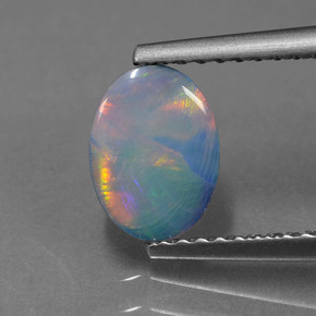 أوبال دوبليت متعدد الألوان طبيعي، بيضوي، 0.69 قيراط، غير شفاف