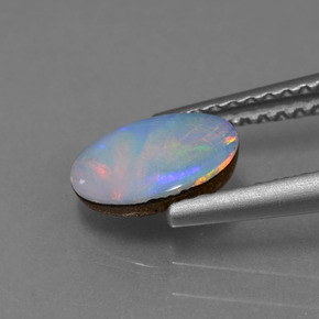 أوبال دوبليت متعدد الألوان طبيعي، بيضوي، 0.69 قيراط، غير شفاف