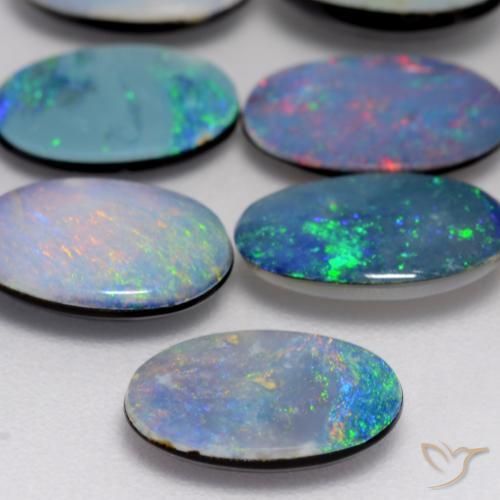 أوبال دوبليت متعدد الألوان طبيعي، بيضوي، 0.88 قيراط، غير شفاف