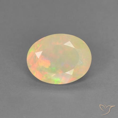 0.74ct طبيعي متعدد الألوان أوبال, بيضوي, نصف شفاف