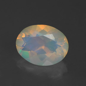 أوبال طبيعي بلون متعدد الألوان، وزن ‎1.07‎ قيراط، شكل بيضاوى، مقاس ‎9x7‎ مم