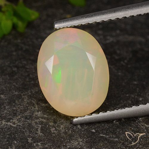 1.96ct طبيعي متعدد الألوان أوبال, بيضوي, شفاف / نصف شفاف