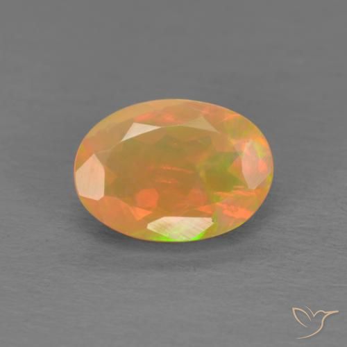 0.74ct طبيعي متعدد الألوان أوبال, بيضوي, نصف شفاف