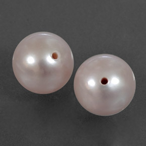 أحجار لؤلؤة وردى برتقالى طبيعية، جسم كروى / الكرة، غير شفاف، وزنها 5.61 قيراط