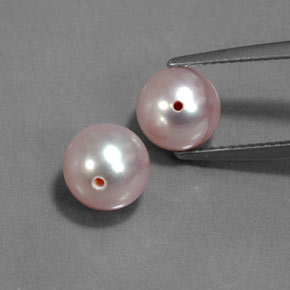 أحجار لؤلؤة وردى فضى طبيعية، جسم كروى / الكرة، غير شفاف، وزنها 5.55 قيراط