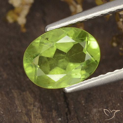 1.38ct طبيعي أخضر متوسط زبرجد, بيضوي, قليلا جدا