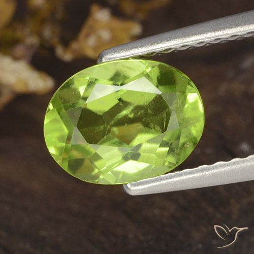 1.38ct طبيعي أخضر حيوي زبرجد, بيضوي, قليلا جدا