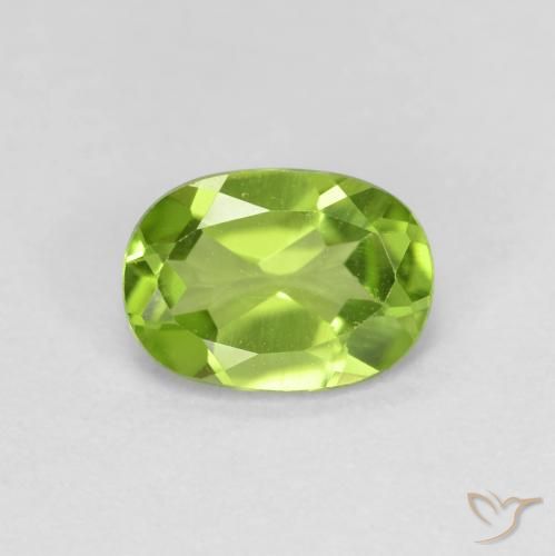 0.89ct طبيعي أخضر مصفر زبرجد, بيضوي, قليلا جدا