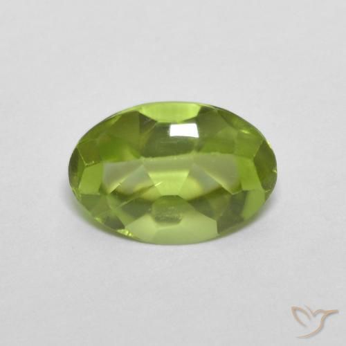 0.84ct طبيعي أخضر متوسط زبرجد, بيضوي, شفاف