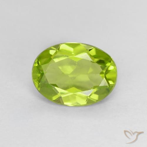 1.24ct طبيعي أخضر مصفر حيوى زبرجد, بيضوي, قليلا جدا