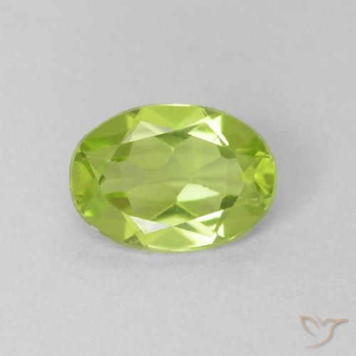 0.73ct طبيعي اخضر زاهى زبرجد, بيضوي, قليلا جدا