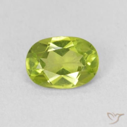 0.91ct طبيعي أخضر مصفر حيوى زبرجد, بيضوي, قليلا جدا