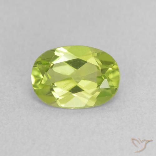 0.85ct طبيعي اخضر زاهى زبرجد, بيضوي, قليلا جدا