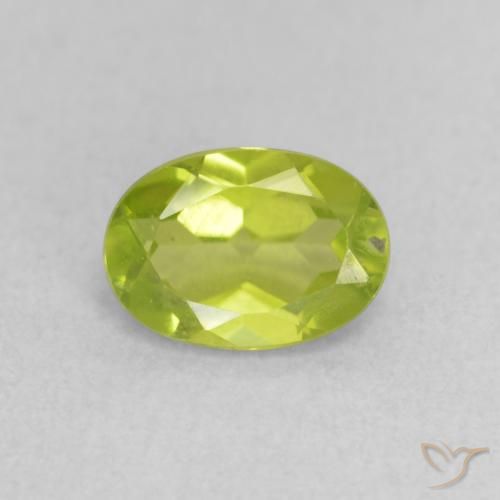 0.87ct طبيعي اخضر زاهى زبرجد, بيضوي, قليلا جدا