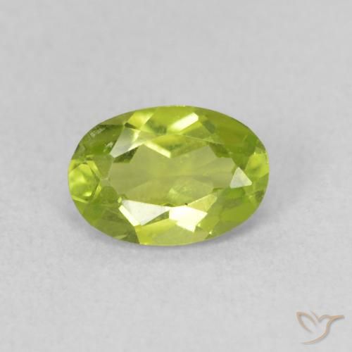 0.84ct طبيعي اخضر زاهى زبرجد, بيضوي, قليلا جدا