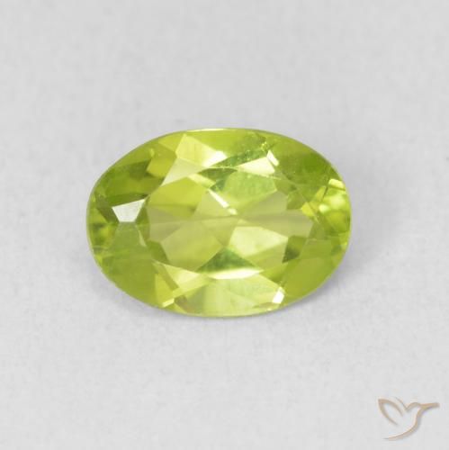 0.85ct طبيعي أخضر مصفر حيوى زبرجد, بيضوي, قليلا جدا