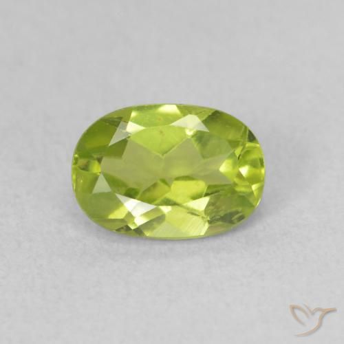 0.92ct طبيعي أخضر مصفر زبرجد, بيضوي, قليلا جدا