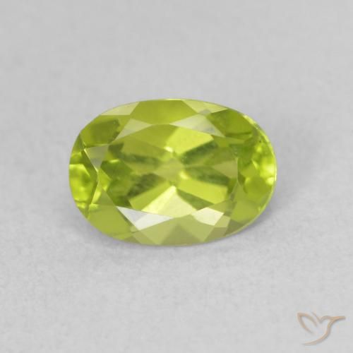 0.98ct طبيعي أخضر مصفر حيوى زبرجد, بيضوي, قليلا جدا