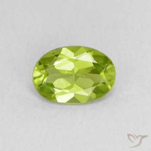 0.76ct طبيعي أخضر متوسط زبرجد, بيضوي, قليلا جدا