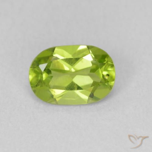 0.86ct طبيعي أخضر مصفر حيوى زبرجد, بيضوي, قليلا جدا