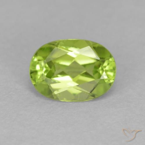 0.90ct طبيعي اخضر زاهى زبرجد, بيضوي, قليلا جدا