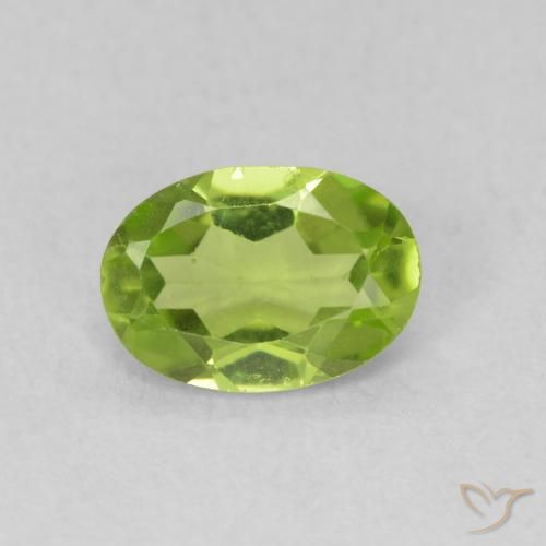 0.75ct طبيعي أخضر حيوي زبرجد, بيضوي, قليلا جدا