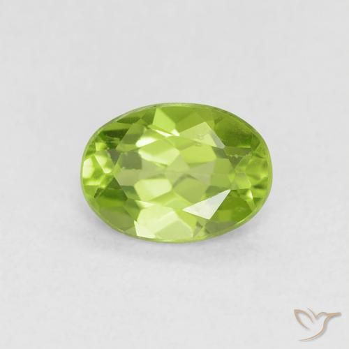 0.79ct طبيعي أخضر مصفر زبرجد, بيضوي, قليلا جدا