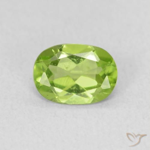0.85ct طبيعي أخضر مصفر زبرجد, بيضوي, قليلا جدا