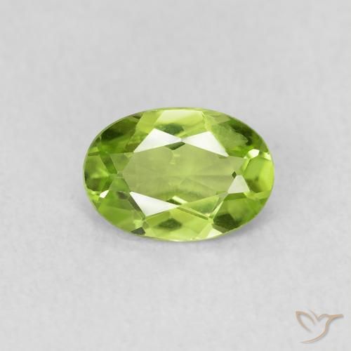 0.69ct طبيعي أخضر متوسط زبرجد, بيضوي, قليلا جدا