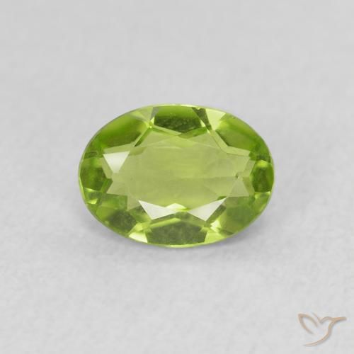 0.82ct طبيعي أخضر متوسط زبرجد, بيضوي, قليلا جدا