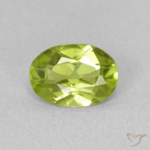 0.75ct طبيعي أخضر مصفر حيوى زبرجد, بيضوي, قليلا جدا