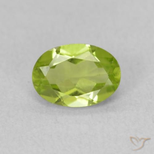 0.80ct طبيعي اخضر زاهى زبرجد, بيضوي, قليلا جدا