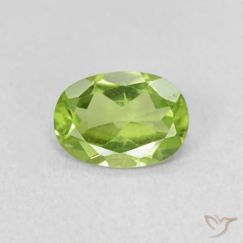 0.79ct طبيعي أخضر متوسط زبرجد, بيضوي, قليلا جدا