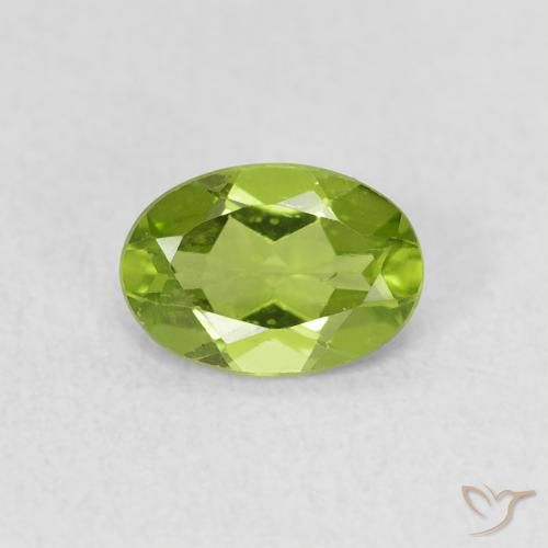 0.75ct طبيعي أخضر متوسط زبرجد, بيضوي, قليلا جدا
