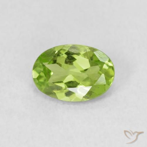 0.75ct طبيعي أخضر متوسط زبرجد, بيضوي, قليلا جدا