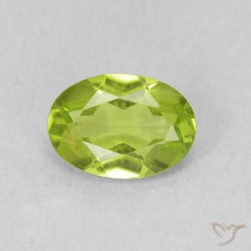 0.84ct طبيعي أخضر مصفر حيوى زبرجد, بيضوي, قليلا جدا